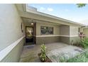 Inviting front porch features decorative accents and a welcoming entrance to the home at 9460 Sw 84Th Ter # F, Ocala, FL 34481