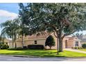 Charming one-story home with well-maintained landscaping at 2721 Day Lily Run, The Villages, FL 32162