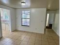 Bright dining area with tile flooring and a view of the kitchen, great for casual meals at 3801 Sw 147Th Lane Rd, Ocala, FL 34473