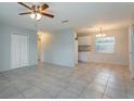 Bright living room with tile flooring and a ceiling fan at 956 Osceola Trl, Casselberry, FL 32707