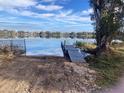 Private dock access with a serene lake view, perfect for fishing and relaxation at 1300 Lucerne Loop Ne Rd, Winter Haven, FL 33881