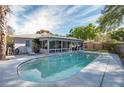 Backyard pool with screen room and patio perfect for outdoor enjoyment and relaxation at 2014 Bardmoor, Winter Haven, FL 33884