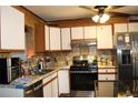 Kitchen with stainless steel appliances at 5031 Timberlane Rd, Lake Wales, FL 33898