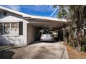 Covered carport next to the house at 1329 Mount Pisgah Rd, Fort Meade, FL 33841