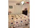 Bedroom with queen-size bed and built-in closet at 1865 4Th Se St, Winter Haven, FL 33880