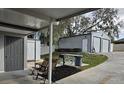 Detached garage with extra parking space at 205 Maple W St, Davenport, FL 33837