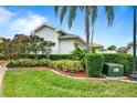 Side view of house showcasing well-maintained landscaping at 3457 Raleigh Dr, Winter Haven, FL 33884