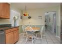 Bright dining area with a charming table and chairs at 615 E Haines Blvd, Lake Alfred, FL 33850