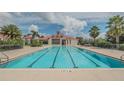 Inviting community lap pool perfect for recreation at 780 Waterfern Trail Dr, Auburndale, FL 33823