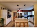 Modern kitchen with granite countertops and white cabinets at 4105 Oak Dr, Winter Haven, FL 33881