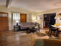 Bright living room with hardwood floors and comfortable seating at 4105 Oak Dr, Winter Haven, FL 33881