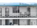Private balcony with table and chairs at 1600 W Lake Parker Dr # C25, Lakeland, FL 33805