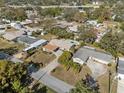 Aerial view showcasing the house and surrounding neighborhood at 412 Hillcrest Se Dr, Winter Haven, FL 33884