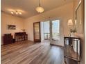 Bright and spacious entryway with wood-look flooring at 5341 Nicklaus Dr, Winter Haven, FL 33884