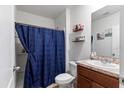 Simple bathroom with shower/tub combo and vanity at 716 Brooklet Dr, Davenport, FL 33837