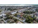An aerial view of the property showcases its proximity to the water and nearby amenities at 115 Jefferson St, Lake Wales, FL 33859