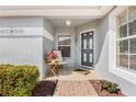 Inviting front porch with cozy seating and decorative accents at 3418 Raleigh Dr, Winter Haven, FL 33884