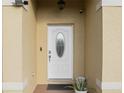 Elegant front door with decorative glass and a welcoming entrance at 1817 Manitoba Ct, Poinciana, FL 34759