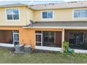 View of the screened patio with an air conditioning unit and greenery outside at 4084 Winding Vine Dr, Lakeland, FL 33812