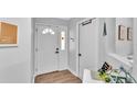 Welcoming entryway features a front door with glass and decorative accents at 433 Carleton St, Lakeland, FL 33803