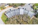 Overhead view showcasing the townhome layout, roof lines, and parking arrangements at 5850 Cypress Gardens Blvd # 206, Winter Haven, FL 33884