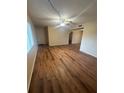 Inviting living room with wood-look floors and bright lighting at 1130 N Lake Parker Ave # E231, Lakeland, FL 33805