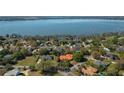 Scenic aerial view of the house near a lake showcasing the property's surroundings at 2506 Partridge Dr, Winter Haven, FL 33884