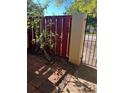 The patio is paved with red bricks, fenced in, and has some shrubbery at 683 Broadmoor Cir # 683, Winter Haven, FL 33884