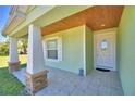 Welcoming front entrance with tiled floor and stylish front door with glass panel at 990 Brooke Rd, Fort Meade, FL 33841
