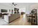 Comfortable living room with open access to the kitchen at 141 Claire Ln, Davenport, FL 33837