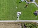 An aerial view of this home featuring a large front and back yard at 3608 Garrard Rd, Fort Meade, FL 33841