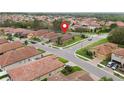 This home is on a corner lot in a quiet residential neighborhood with mature trees and manicured lawns at 4004 Prima Lago Cir, Lakeland, FL 33810