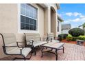 Inviting outdoor patio with comfortable seating and a brick-paved area at 4009 Bedford Ave, Winter Haven, FL 33884