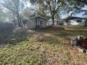 Spacious backyard, perfect for entertaining, with greenery and lots of space at 626 N Nashua Ave, Fort Meade, FL 33841