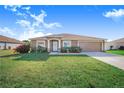 Charming single-story home with a well-maintained lawn and appealing curb appeal at 238 Lake Eloise Pointe Blvd, Winter Haven, FL 33880