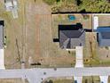Aerial view of home showcasing yard size and proximity to other properties and community features at 747 Fraser Ct, Kissimmee, FL 34759