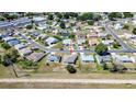 An aerial view of a residential area with well-maintained homes and landscaping, showcasing community layout at 1055 Canary S Cir, Lakeland, FL 33809