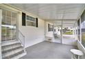 Comfortable screened-in patio perfect for relaxing and enjoying the outdoors at 6510 Oak Hammock Ln, Winter Haven, FL 33884