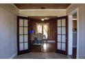 Elegant dining room featuring warm wood accents and a stylish table setting, perfect for hosting intimate gatherings at 420 N 5Th St, Lake Wales, FL 33853