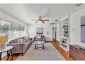 Well-lit living room with hardwood floors, neutral furniture, and a cozy atmosphere at 1032 Tower Blvd, Lake Wales, FL 33853