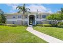 Charming two-story condo with manicured lawn and a welcoming walkway at 1602 Eagle Pond Dr # 1602, Winter Haven, FL 33884