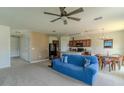 Open floor plan with a seamless transition from the living area to the kitchen and dining space at 249 Haines Blvd, Winter Haven, FL 33881