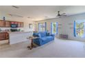 Cozy living room with abundant natural light and a view of the backyard at 249 Haines Blvd, Winter Haven, FL 33881