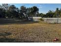 A spacious backyard with a full perimeter fence at 3265 Conine, Winter Haven, FL 33881
