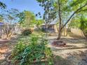 Beautiful backyard showcasing lush greenery and peaceful surroundings, ideal for enjoying the outdoors at 711 Lake Dexter Cir, Winter Haven, FL 33884