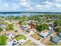 A high angle view of the home and surrounding area, showing nearby lake at 806 Avenue G Ne, Winter Haven, FL 33881