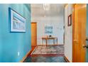 Inviting foyer with stylish decor and a view into the main living areas at 4365 Canal Rd, Lake Wales, FL 33898