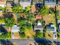 Aerial view showcases property lines and surrounding neighborhood at 1371 Sheridan Sw St, Winter Haven, FL 33880