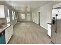 Open-concept living room with lots of natural light at 602 Nw 1St Ave, Mulberry, FL 33860