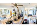 Cozy living room with comfortable seating, open floor plan, and plenty of natural light at 6305 Bayberry Ne Blvd, Winter Haven, FL 33881